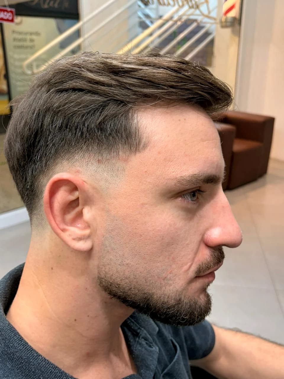 Corte degradê com barba alinhada, feito na Eleve Barbearia